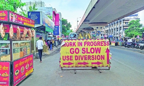 Dilapidated bridge on road near Panchasheel Square