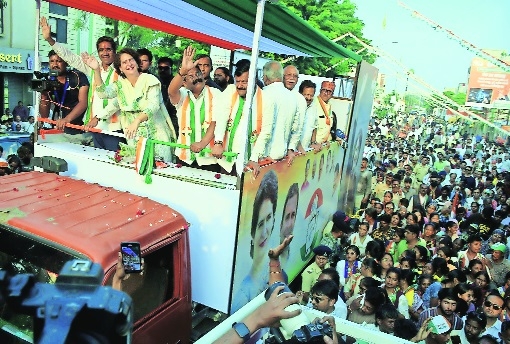 Priyanka Gandhi waving to crowd during nagpur