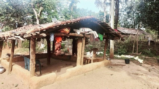 This hut is a school in day, residence at night!