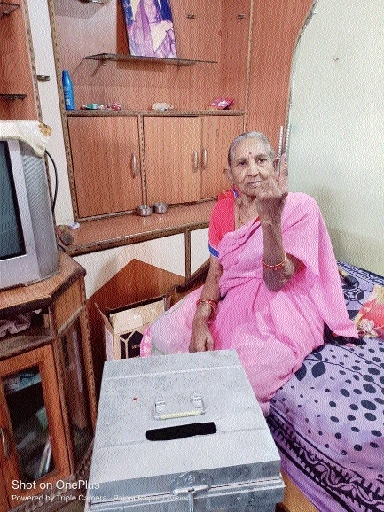 An elderly woman exercising