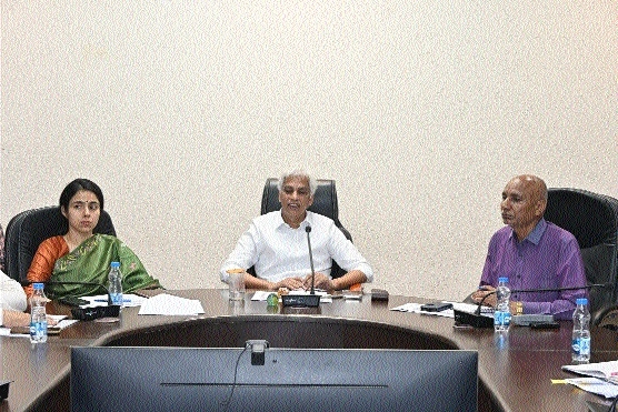 Collector Deepak Saxena chairing 