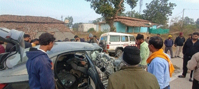 Damaged car seen at the scene