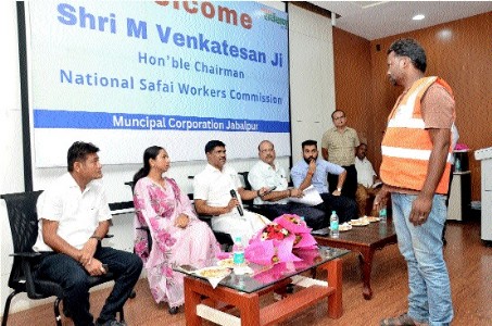 Chairman of NCSK Venkatesan listens to sanitation workers’ issues