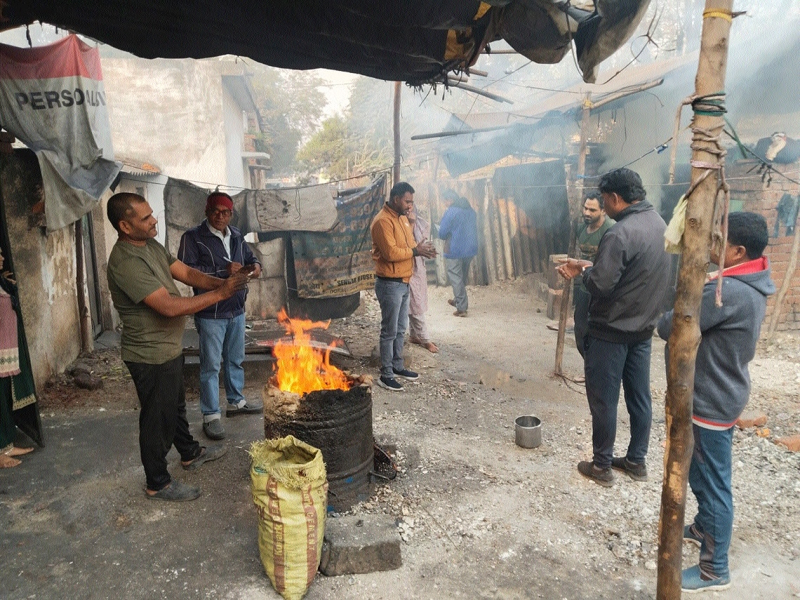 People hoarding around bonfire